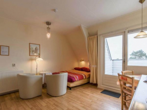 Unique studio on a large estate in Bergen aan Zee with balcony and sea view